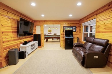 Price to move, this custom-built home sits on a roundabout on Hampton Golf Village in Georgia - for sale on GolfHomes.com, golf home, golf lot