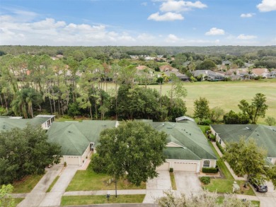 Enjoy Serene GOLF COURSE, Pond and Wooded Views from this LAKE on The Links of Lake Bernadette in Florida - for sale on GolfHomes.com, golf home, golf lot