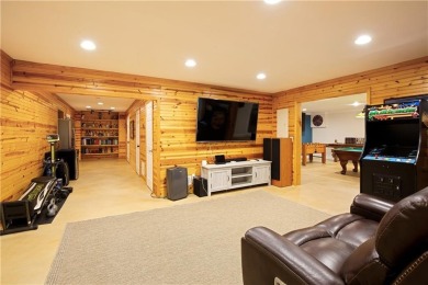 Price to move, this custom-built home sits on a roundabout on Hampton Golf Village in Georgia - for sale on GolfHomes.com, golf home, golf lot