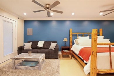 Price to move, this custom-built home sits on a roundabout on Hampton Golf Village in Georgia - for sale on GolfHomes.com, golf home, golf lot