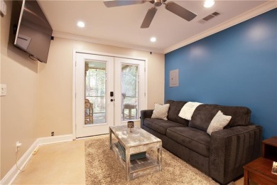 Price to move, this custom-built home sits on a roundabout on Hampton Golf Village in Georgia - for sale on GolfHomes.com, golf home, golf lot