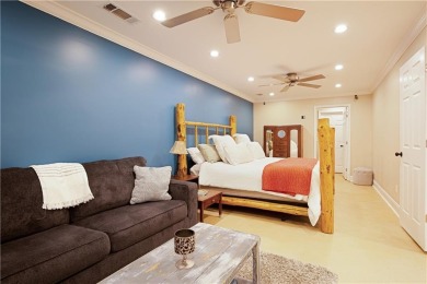 Price to move, this custom-built home sits on a roundabout on Hampton Golf Village in Georgia - for sale on GolfHomes.com, golf home, golf lot