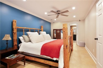 Price to move, this custom-built home sits on a roundabout on Hampton Golf Village in Georgia - for sale on GolfHomes.com, golf home, golf lot