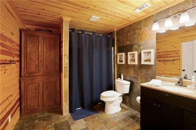 Price to move, this custom-built home sits on a roundabout on Hampton Golf Village in Georgia - for sale on GolfHomes.com, golf home, golf lot