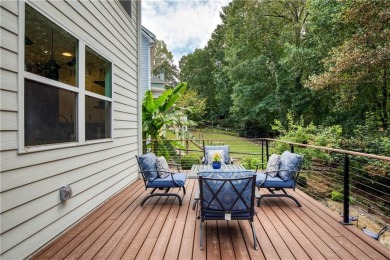 Price to move, this custom-built home sits on a roundabout on Hampton Golf Village in Georgia - for sale on GolfHomes.com, golf home, golf lot