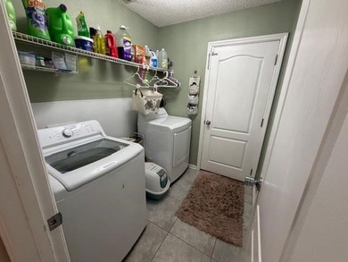 Room For The Cars,Tools,And Everything In Between! This on St. Johns Golf Club in Florida - for sale on GolfHomes.com, golf home, golf lot