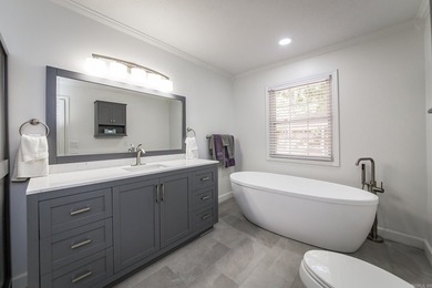 Tucked into a serene, park-like setting, this beautifully on Mountain Ranch Golf Club in Arkansas - for sale on GolfHomes.com, golf home, golf lot