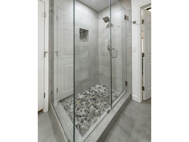 Tucked into a serene, park-like setting, this beautifully on Mountain Ranch Golf Club in Arkansas - for sale on GolfHomes.com, golf home, golf lot