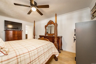 Tucked into a serene, park-like setting, this beautifully on Mountain Ranch Golf Club in Arkansas - for sale on GolfHomes.com, golf home, golf lot