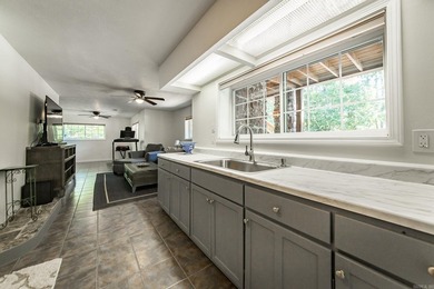 Tucked into a serene, park-like setting, this beautifully on Mountain Ranch Golf Club in Arkansas - for sale on GolfHomes.com, golf home, golf lot