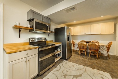 Tucked into a serene, park-like setting, this beautifully on Mountain Ranch Golf Club in Arkansas - for sale on GolfHomes.com, golf home, golf lot