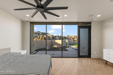 Perfectly situated amongst the basalt rocks at the base of Snow on Entrada at Snow Canyon in Utah - for sale on GolfHomes.com, golf home, golf lot