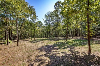 Tucked into a serene, park-like setting, this beautifully on Mountain Ranch Golf Club in Arkansas - for sale on GolfHomes.com, golf home, golf lot