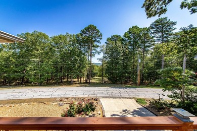 Tucked into a serene, park-like setting, this beautifully on Mountain Ranch Golf Club in Arkansas - for sale on GolfHomes.com, golf home, golf lot