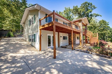 Tucked into a serene, park-like setting, this beautifully on Mountain Ranch Golf Club in Arkansas - for sale on GolfHomes.com, golf home, golf lot