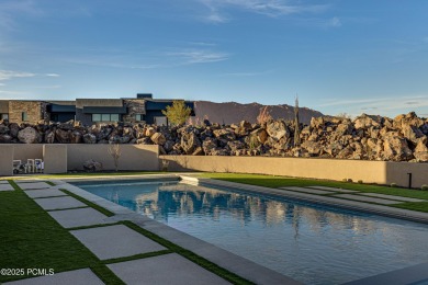 Perfectly situated amongst the basalt rocks at the base of Snow on Entrada at Snow Canyon in Utah - for sale on GolfHomes.com, golf home, golf lot