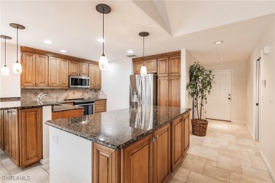 Experience resort-style living in this beautifully maintained on Estero Country Club in Florida - for sale on GolfHomes.com, golf home, golf lot