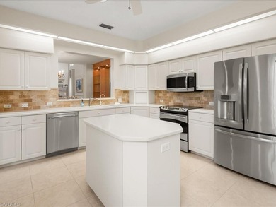 Perfectly positioned within the private enclave of Wyndemere on Windstar on Naples Bay in Florida - for sale on GolfHomes.com, golf home, golf lot