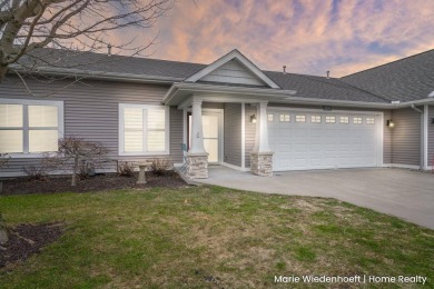 Welcome home to this stunning 2-bedroom, 2.5-bathroom condo with on The Links At Rolling Meadows in Michigan - for sale on GolfHomes.com, golf home, golf lot