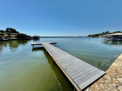 IT'S ALL ABOUT THE VIEW! This well-appointed waterfront condo is on De Cordova Bend Country Club in Texas - for sale on GolfHomes.com, golf home, golf lot