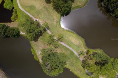 One or more photo(s) has been virtually staged. Showstopper Home on The Eagles Golf Course and Club in Florida - for sale on GolfHomes.com, golf home, golf lot