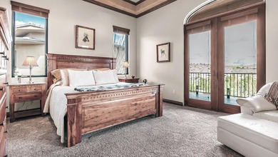 Set high above the 9th hole in Redlands Mesa, 324 Iron Horse Ct on The Golf Club At Redlands Mesa in Colorado - for sale on GolfHomes.com, golf home, golf lot