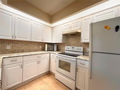 IMPECCABLE UNIT IN THE HEART OF PEMBROKE PINES, RESORT STYLE!! on Flamingo Lakes Country Club in Florida - for sale on GolfHomes.com, golf home, golf lot