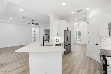 Welcome to luxury living in the prestigious Shadow Wood Preserve on Shadow Wood Preserve in Florida - for sale on GolfHomes.com, golf home, golf lot