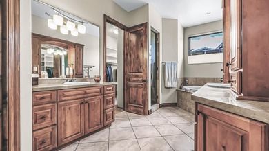 Set high above the 9th hole in Redlands Mesa, 324 Iron Horse Ct on The Golf Club At Redlands Mesa in Colorado - for sale on GolfHomes.com, golf home, golf lot