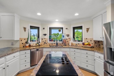 Nestled on the sought-after east bench of Bountiful, this on Bountiful Ridge Golf Course in Utah - for sale on GolfHomes.com, golf home, golf lot
