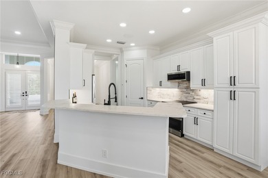 Welcome to luxury living in the prestigious Shadow Wood Preserve on Shadow Wood Preserve in Florida - for sale on GolfHomes.com, golf home, golf lot