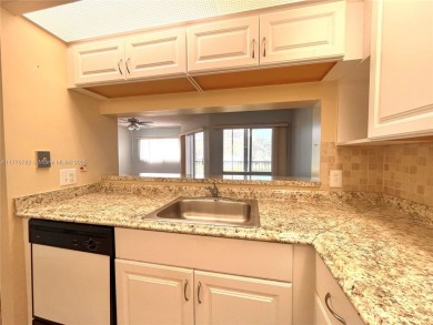 IMPECCABLE UNIT IN THE HEART OF PEMBROKE PINES, RESORT STYLE!! on Flamingo Lakes Country Club in Florida - for sale on GolfHomes.com, golf home, golf lot