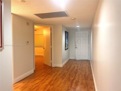 IMPECCABLE UNIT IN THE HEART OF PEMBROKE PINES, RESORT STYLE!! on Flamingo Lakes Country Club in Florida - for sale on GolfHomes.com, golf home, golf lot
