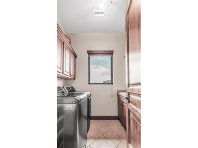 Set high above the 9th hole in Redlands Mesa, 324 Iron Horse Ct on The Golf Club At Redlands Mesa in Colorado - for sale on GolfHomes.com, golf home, golf lot