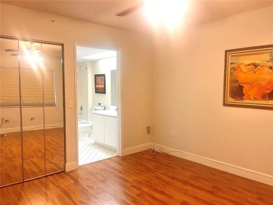 IMPECCABLE UNIT IN THE HEART OF PEMBROKE PINES, RESORT STYLE!! on Flamingo Lakes Country Club in Florida - for sale on GolfHomes.com, golf home, golf lot