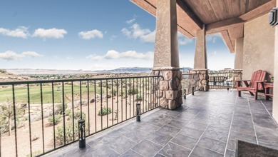 Set high above the 9th hole in Redlands Mesa, 324 Iron Horse Ct on The Golf Club At Redlands Mesa in Colorado - for sale on GolfHomes.com, golf home, golf lot