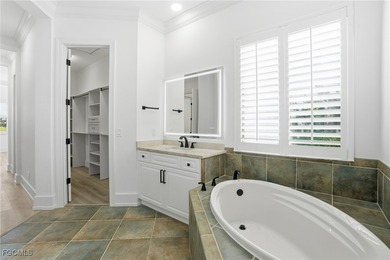 Welcome to luxury living in the prestigious Shadow Wood Preserve on Shadow Wood Preserve in Florida - for sale on GolfHomes.com, golf home, golf lot