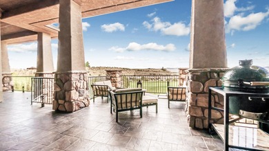 Set high above the 9th hole in Redlands Mesa, 324 Iron Horse Ct on The Golf Club At Redlands Mesa in Colorado - for sale on GolfHomes.com, golf home, golf lot