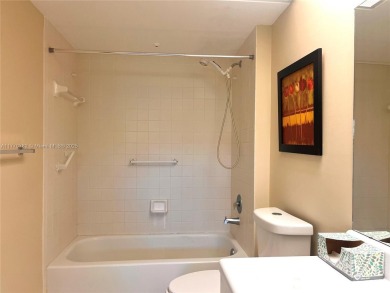IMPECCABLE UNIT IN THE HEART OF PEMBROKE PINES, RESORT STYLE!! on Flamingo Lakes Country Club in Florida - for sale on GolfHomes.com, golf home, golf lot