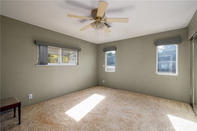 Charming golf course home located in the Canyon Lake Mobile on Canyon Lake Country Club in California - for sale on GolfHomes.com, golf home, golf lot