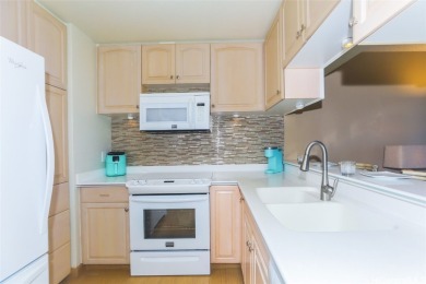 Gorgeous, FULLY REMODELED 6th floor unit features lovely ocean on Makaha Valley Country Club in Hawaii - for sale on GolfHomes.com, golf home, golf lot