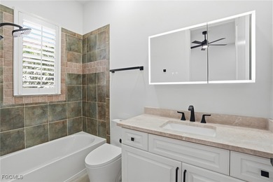 Welcome to luxury living in the prestigious Shadow Wood Preserve on Shadow Wood Preserve in Florida - for sale on GolfHomes.com, golf home, golf lot