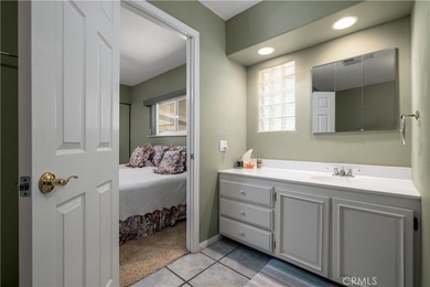 Charming golf course home located in the Canyon Lake Mobile on Canyon Lake Country Club in California - for sale on GolfHomes.com, golf home, golf lot