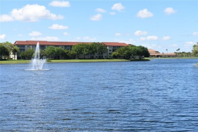 IMPECCABLE UNIT IN THE HEART OF PEMBROKE PINES, RESORT STYLE!! on Flamingo Lakes Country Club in Florida - for sale on GolfHomes.com, golf home, golf lot