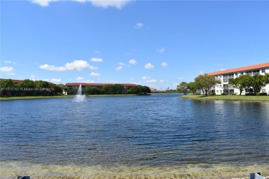 IMPECCABLE UNIT IN THE HEART OF PEMBROKE PINES, RESORT STYLE!! on Flamingo Lakes Country Club in Florida - for sale on GolfHomes.com, golf home, golf lot