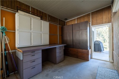 Charming golf course home located in the Canyon Lake Mobile on Canyon Lake Country Club in California - for sale on GolfHomes.com, golf home, golf lot