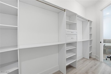 Welcome to luxury living in the prestigious Shadow Wood Preserve on Shadow Wood Preserve in Florida - for sale on GolfHomes.com, golf home, golf lot