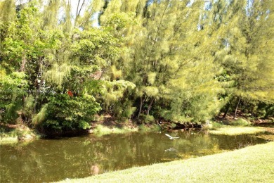 IMPECCABLE UNIT IN THE HEART OF PEMBROKE PINES, RESORT STYLE!! on Flamingo Lakes Country Club in Florida - for sale on GolfHomes.com, golf home, golf lot