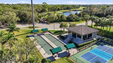 Welcome to luxury living in the prestigious Shadow Wood Preserve on Shadow Wood Preserve in Florida - for sale on GolfHomes.com, golf home, golf lot