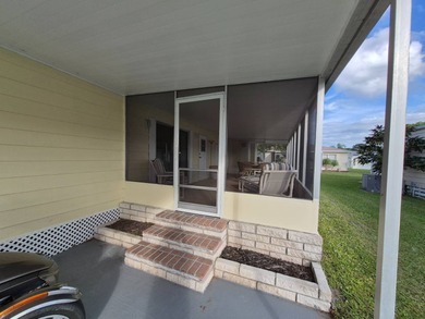 This 1982 2 bed 2 bath is in a 55+ Spanish lakes community. It on Spanish Lakes Country Club in Florida - for sale on GolfHomes.com, golf home, golf lot